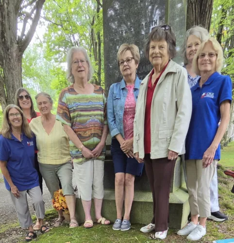 DAR chapter picnics in cemetery